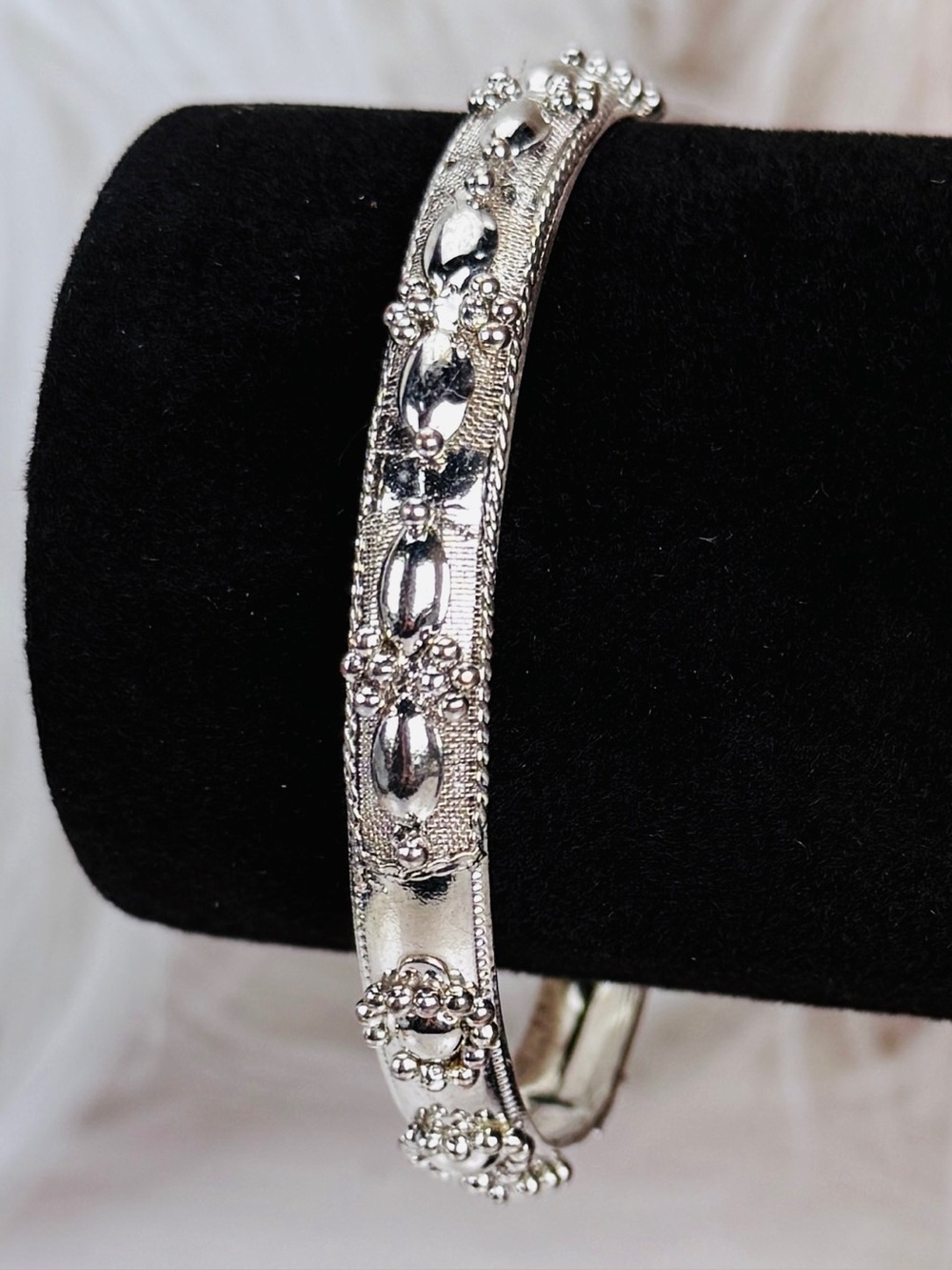 Pretty Silvertone costume bangle bracelet